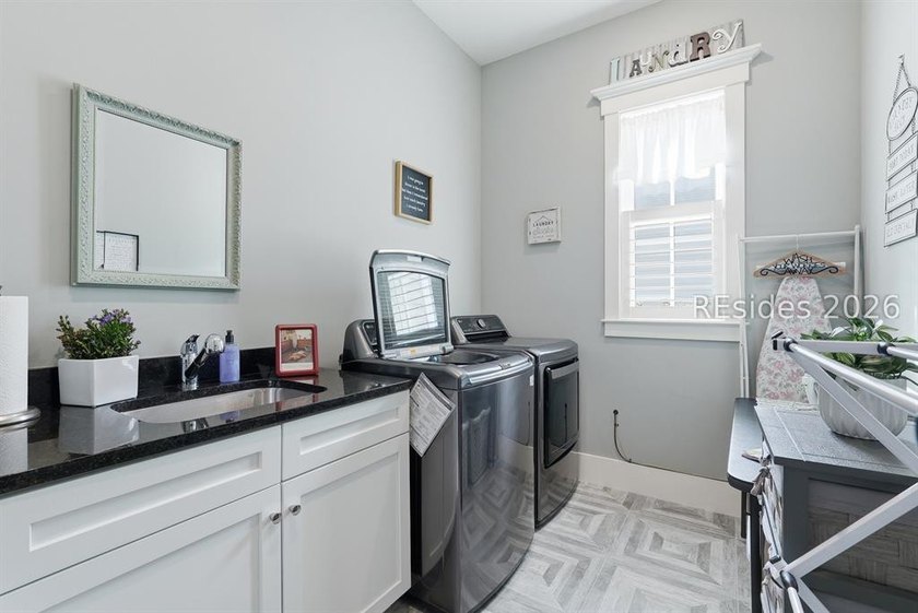 Custom-built by Shoreline Construction in 2018, this beautifully - photo 30