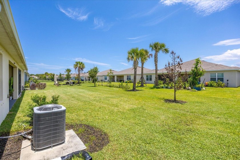 Welcome to this charming 3-bedroom, 2-bath villa in Avalon - photo 32