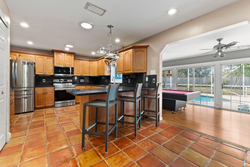 Explore this 4 Bed, 2 Bath pool home offering 1,800 sq ft under - photo 8