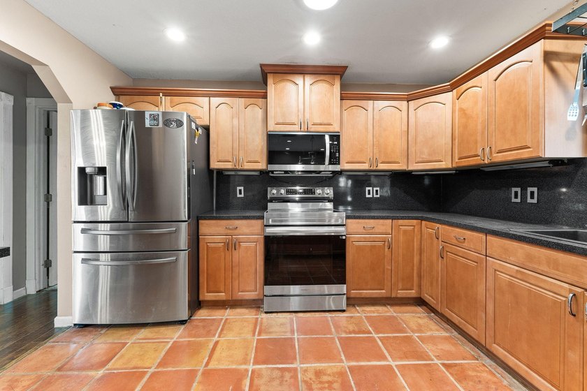 Explore this 4 Bed, 2 Bath pool home offering 1,800 sq ft under - photo 9