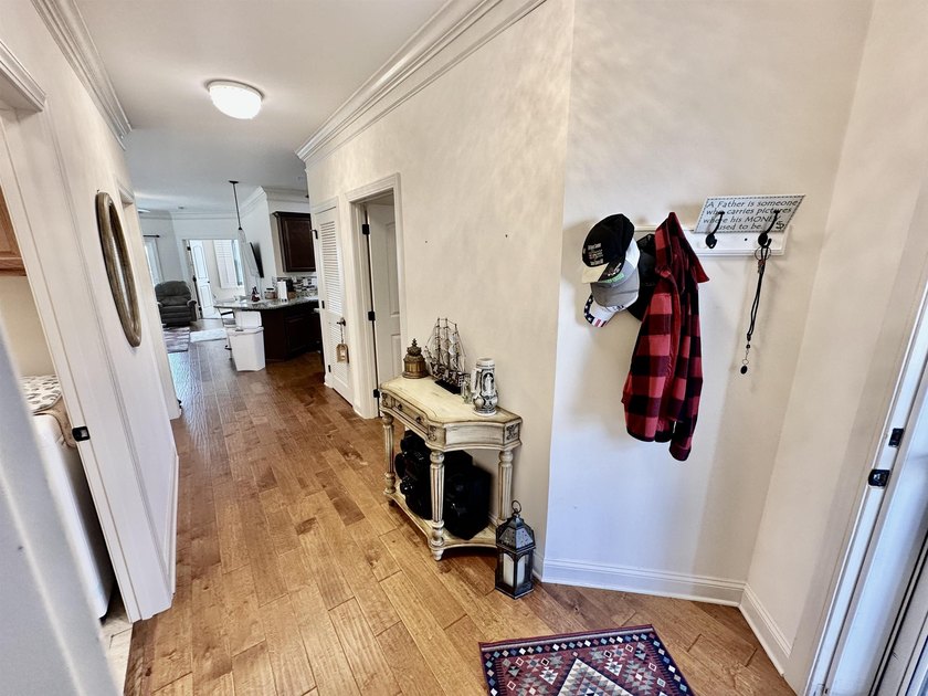 Welcome to this elegant three-bedroom, two-bathroom condominium - photo 2