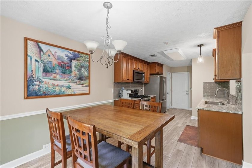 Rare opportunity to own a charming 3-bedroom, 2-bath ranch on 2 - photo 16