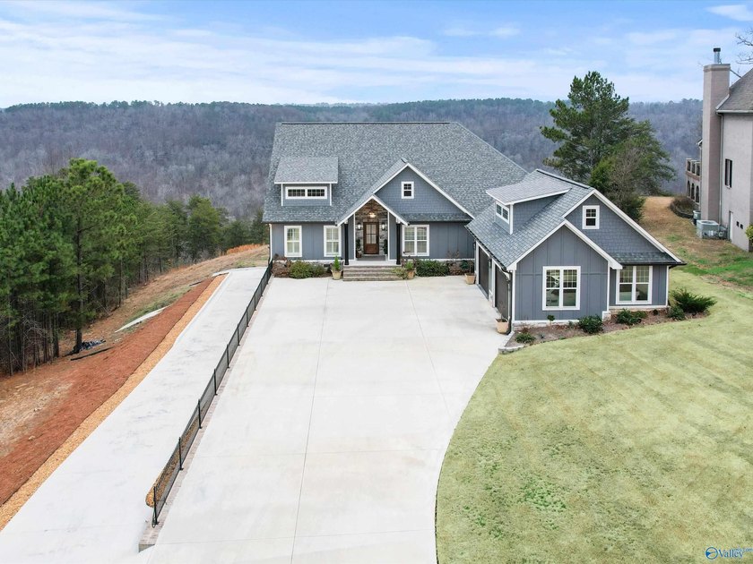 Custom-bulit 2023 mountain home offering 2542 sq ft of refined - photo 3