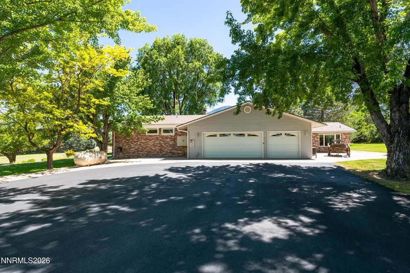 Nestled on 2 picturesque acres in the heart of the beautiful - photo 3