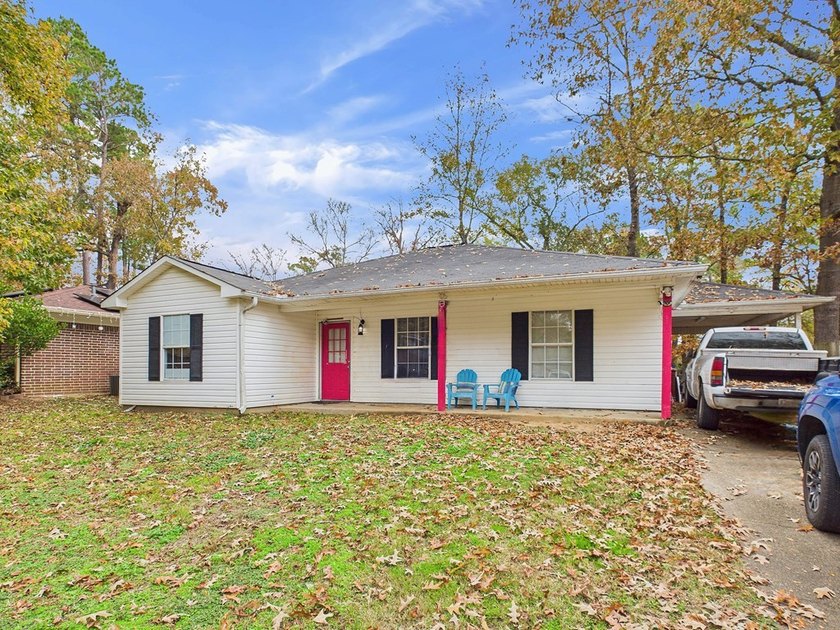 Move-in ready and priced to sell! This 4-bedroom, 2-bath home in - photo 2