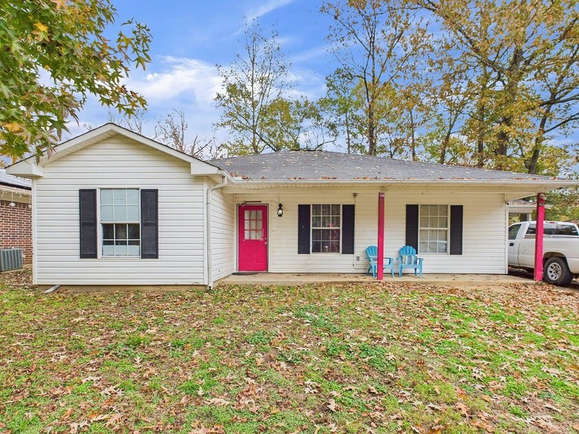 Move-in ready and priced to sell! This 4-bedroom, 2-bath home in - photo 3