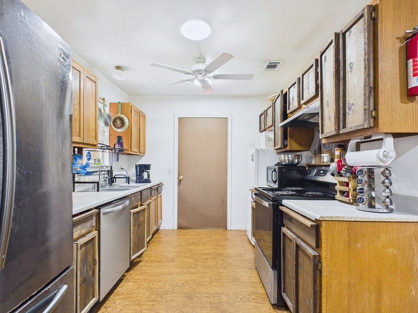 Move-in ready and priced to sell! This 4-bedroom, 2-bath home in - photo 6