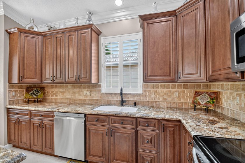 Welcome to 9575 Sandpiper Shores Way in the sought-after - photo 24