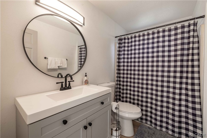 Income averaging $5k monthly this home is -Tucked against a - photo 12