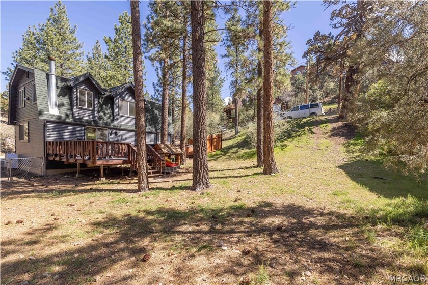 Income averaging $5k monthly this home is -Tucked against a - photo 26