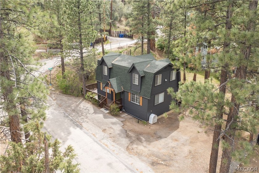 Income averaging $5k monthly this home is -Tucked against a - photo 32