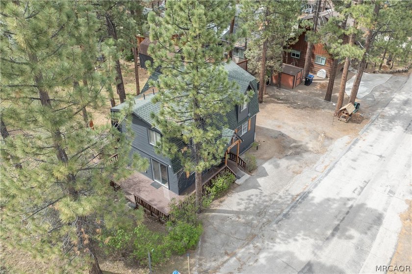 Income averaging $5k monthly this home is -Tucked against a - photo 33