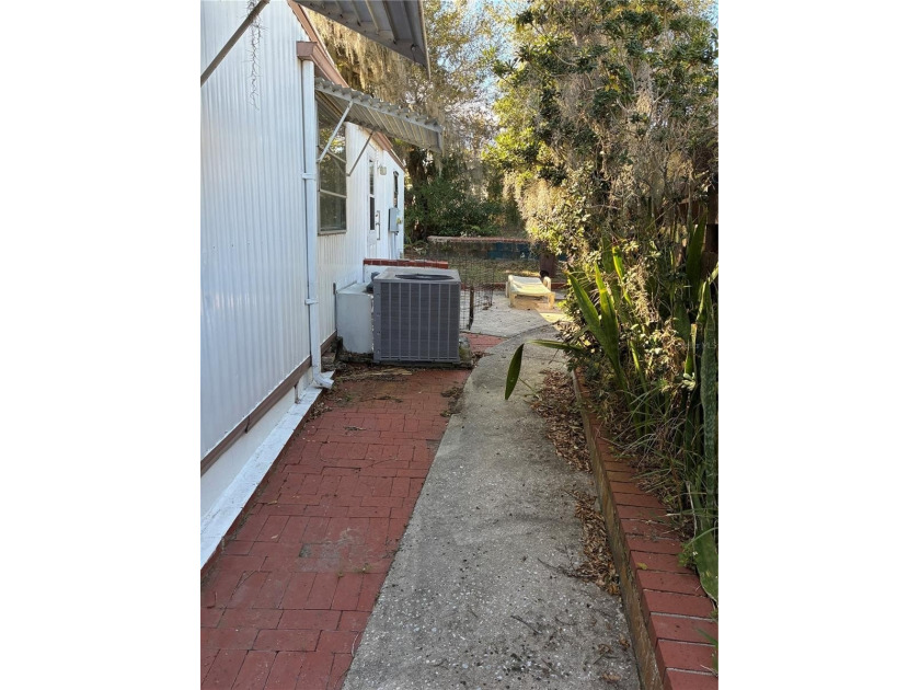 This home is located in a 55+ Community.   Situated on the Chain - photo 3