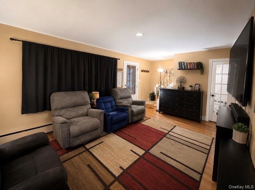 Located in the Hamlet of Ridge this spacious two bedroom one - photo 3