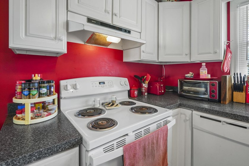 Charming 4-bedroom home situated on a spacious corner lot shaded - photo 8