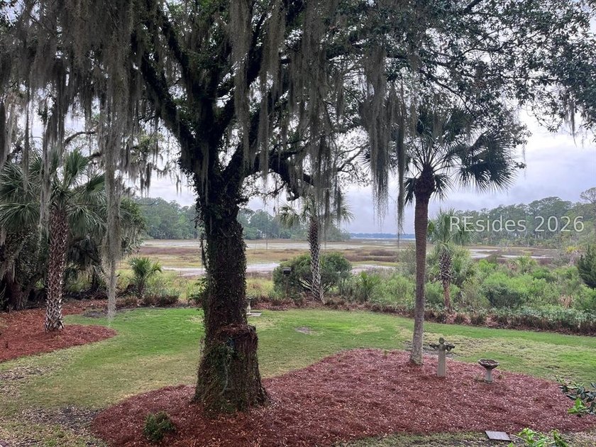 Set against a breathtaking Lowcountry backdrop, this stately - photo 2