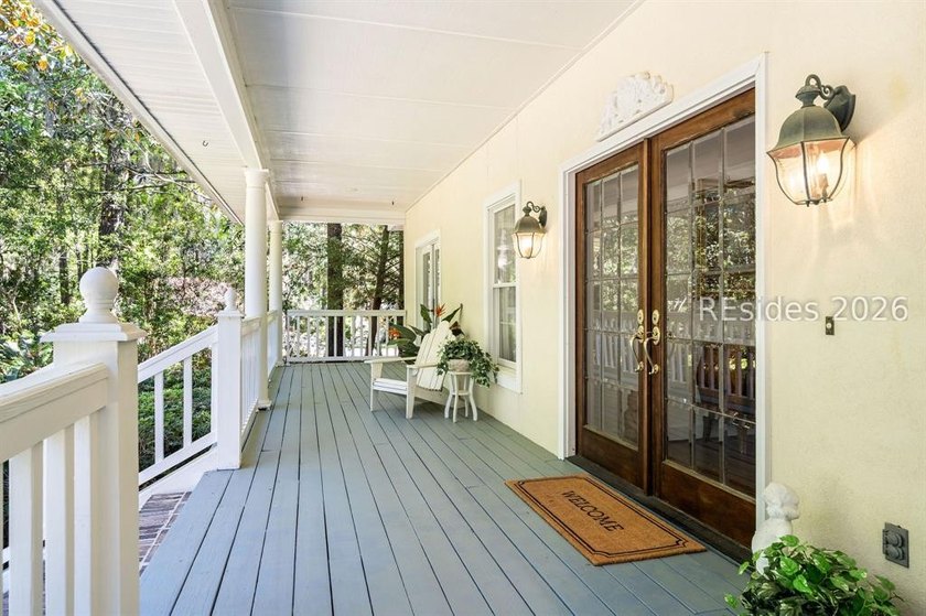 Set against a breathtaking Lowcountry backdrop, this stately - photo 5