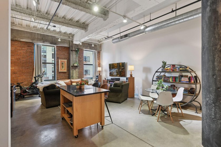 Welcome to this stunning one bedroom + den condo at the historic - photo 2