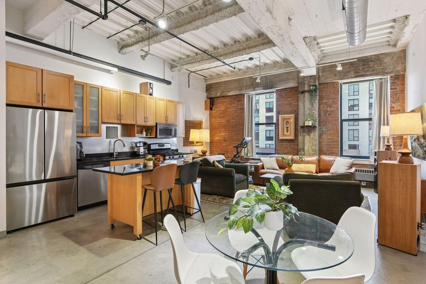 Welcome to this stunning one bedroom + den condo at the historic - photo 4