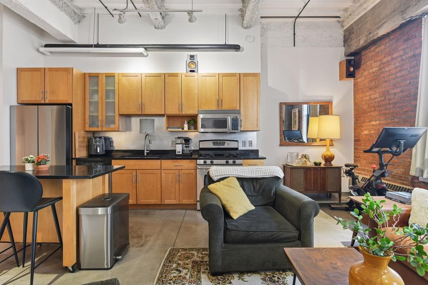 Welcome to this stunning one bedroom + den condo at the historic - photo 9
