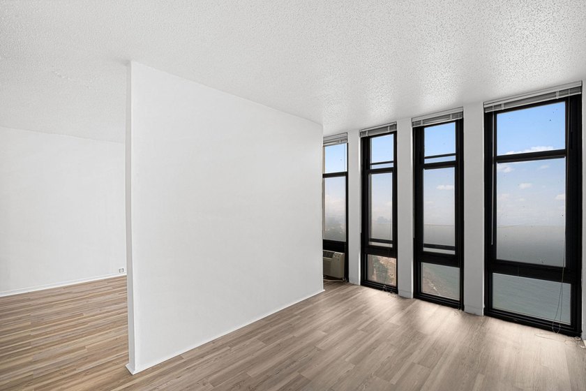Stunning lake and skyline views await in this spacious - photo 5