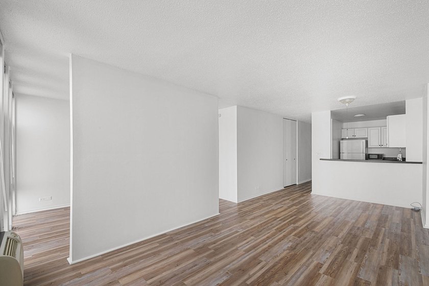 Stunning lake and skyline views await in this spacious - photo 7