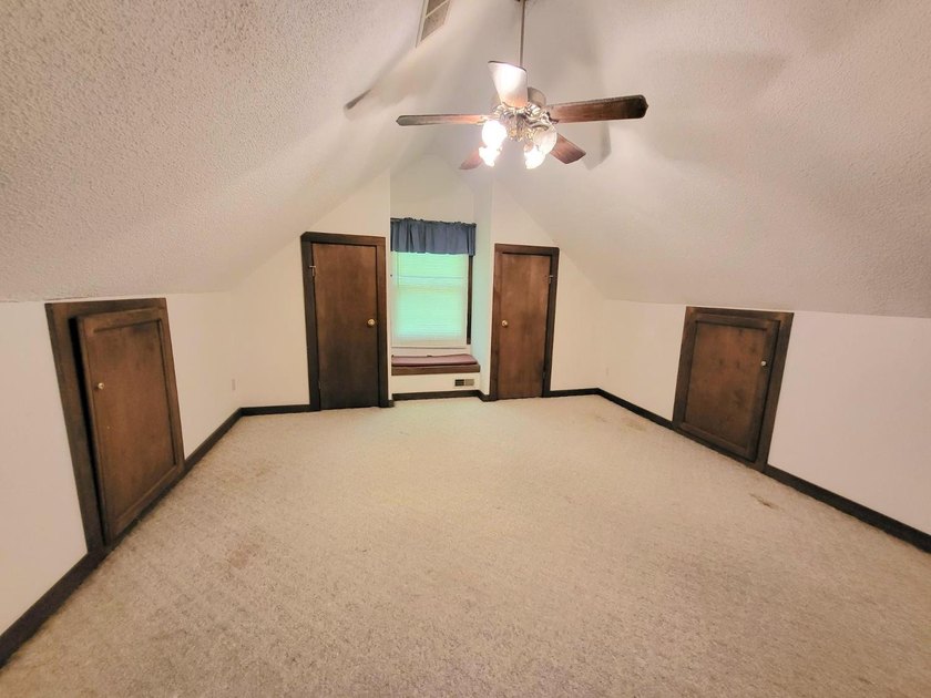 Cabin vibes, wooded views, extra lot, under $300,000.00. Located - photo 9