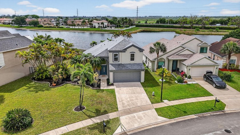 Welcome to this beautifully updated home located in the highly - photo 2