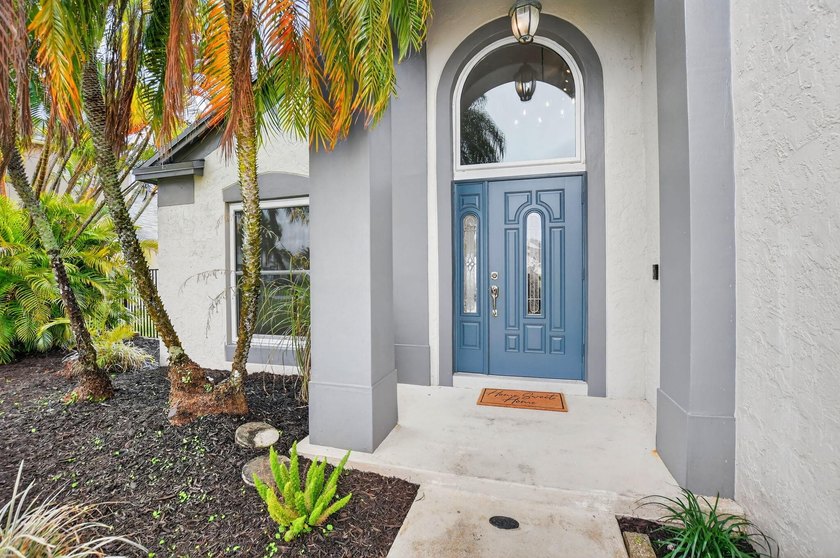 Welcome to this beautifully updated home located in the highly - photo 3