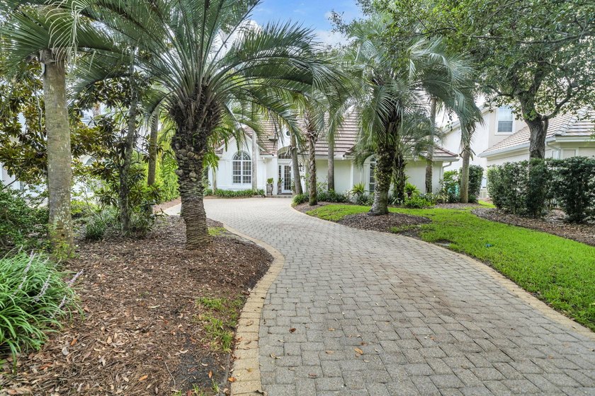 Welcome to luxury, low-maintenance living in the prestigious - photo 3