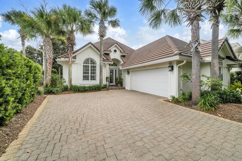 Welcome to luxury, low-maintenance living in the prestigious - photo 5