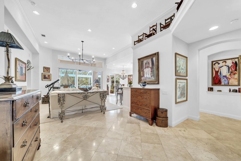 Welcome to luxury, low-maintenance living in the prestigious - photo 7