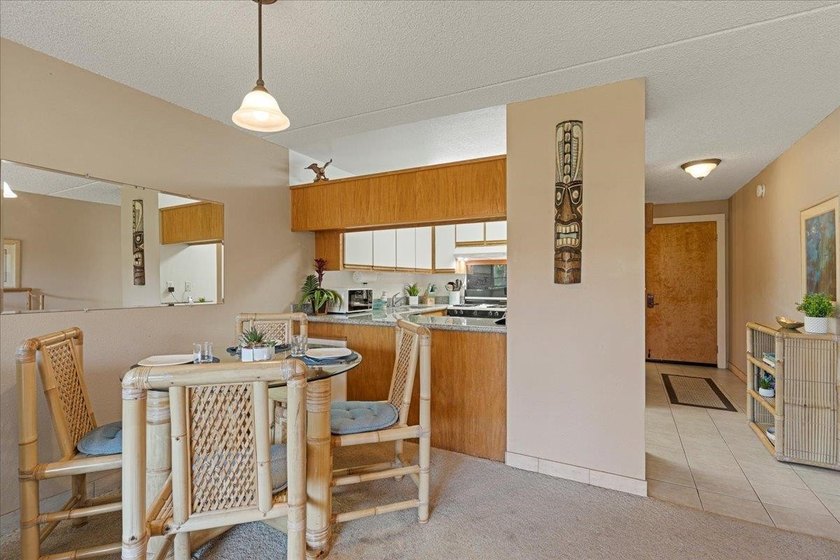 Aloha and welcome to Kihei Akahi C-317! This hotel-zoned - photo 8