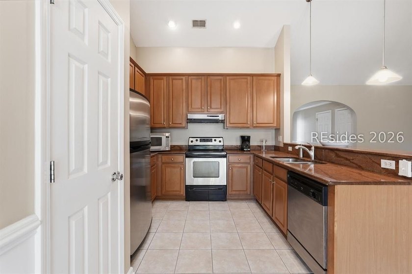 Enjoy peaceful lagoon views and an open-concept home, ideally - photo 10