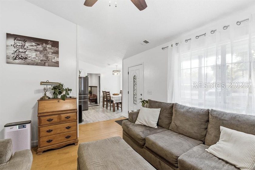 NO HOA! Spacious and inviting 4-bedroom, 2-bath brick home - photo 6