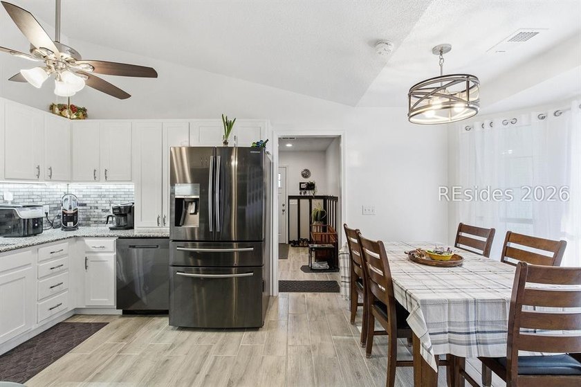 NO HOA! Spacious and inviting 4-bedroom, 2-bath brick home - photo 10