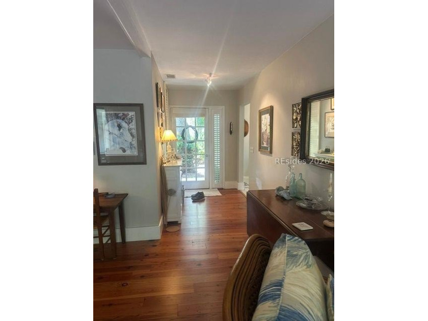 This charming two-bedroom, two-bathroom home is nestled in the - photo 4