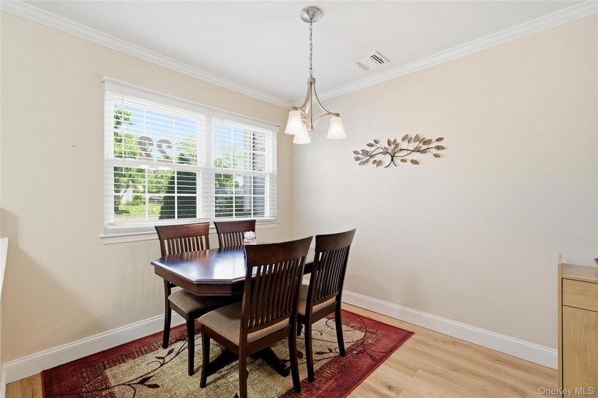 Welcome to The Meadows at Kings Park, a private, serene, and - photo 5