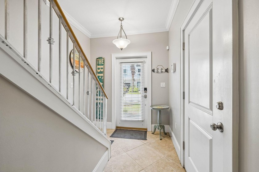 Turnkey 3-story townhome in the Coastal Dunes community -- just - photo 5