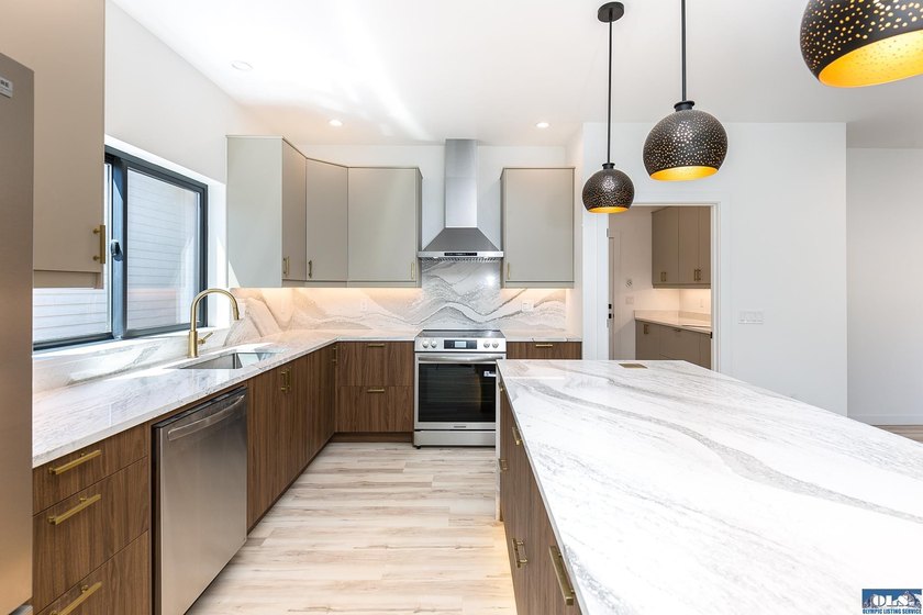 Welcome home to this beautifully designed newly constructed - photo 11