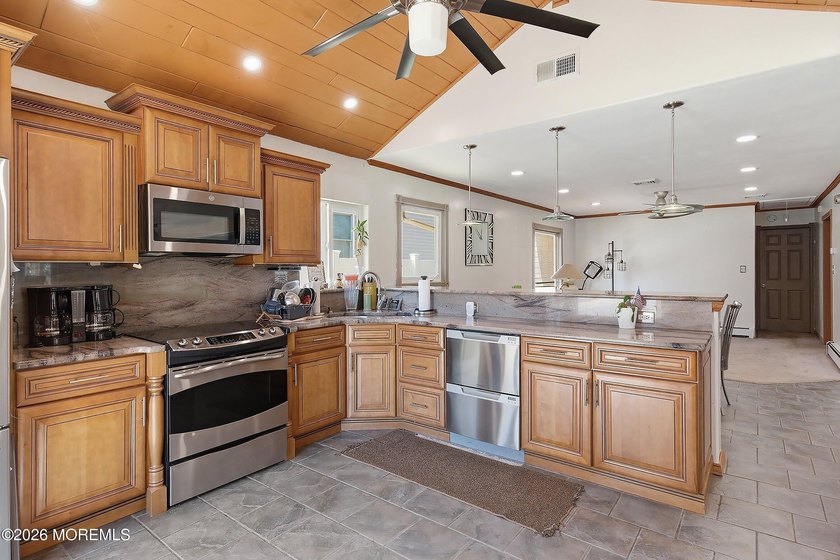 Tucked away on nearly 2 acres of private property, this - photo 4