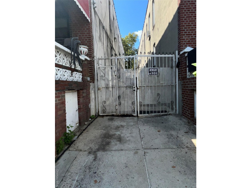 Welcome to this solid brick 4-family attached home located in - photo 3
