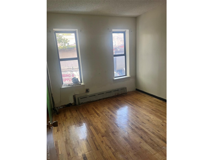 Welcome to this solid brick 4-family attached home located in - photo 4