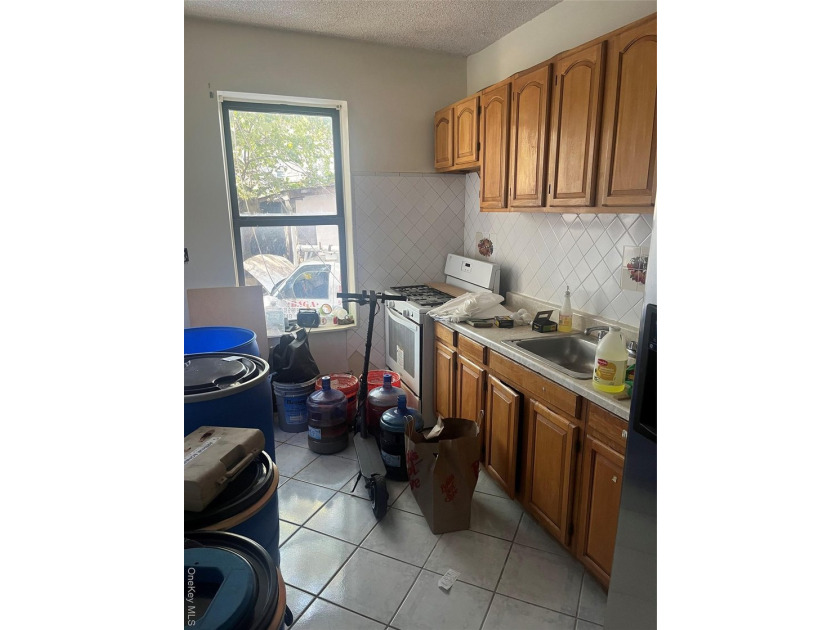 Welcome to this solid brick 4-family attached home located in - photo 5