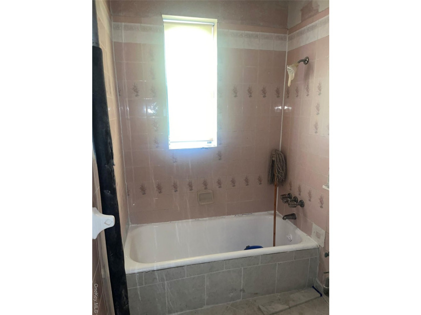 Welcome to this solid brick 4-family attached home located in - photo 6