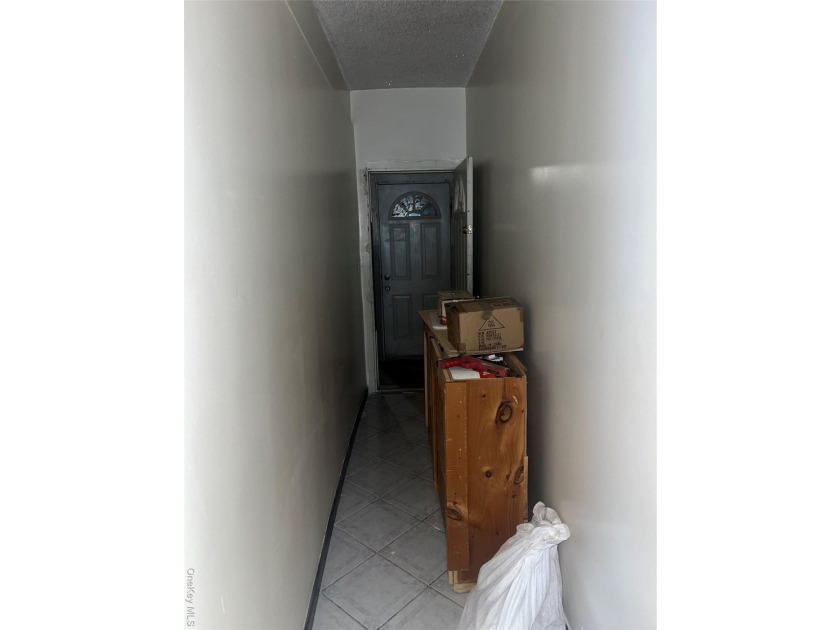 Welcome to this solid brick 4-family attached home located in - photo 7