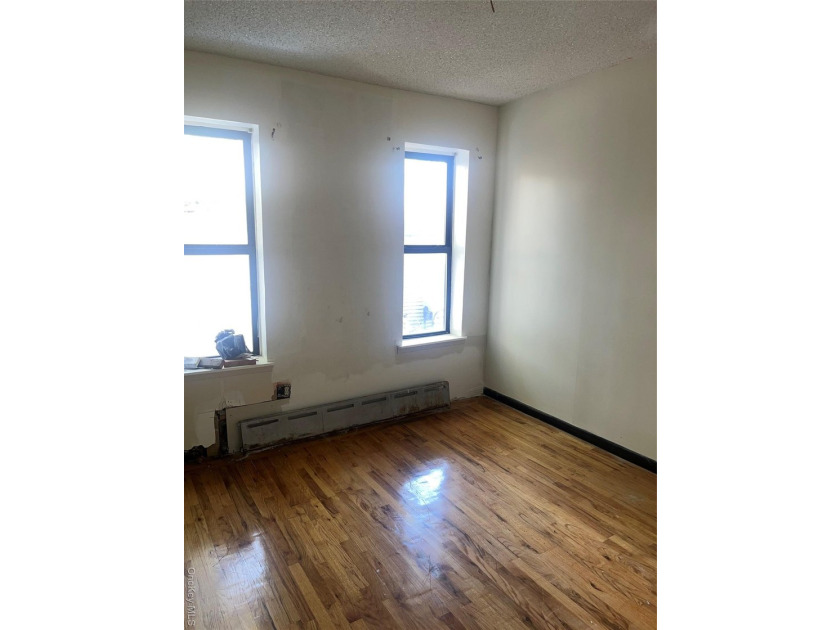 Welcome to this solid brick 4-family attached home located in - photo 10