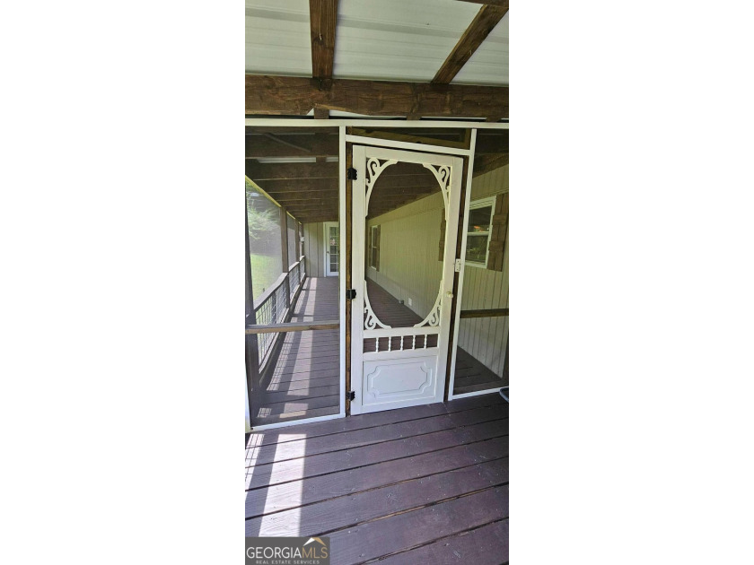 Tucked away at 567 Dale Trail in Menlo, GA, this isn't just a - photo 8