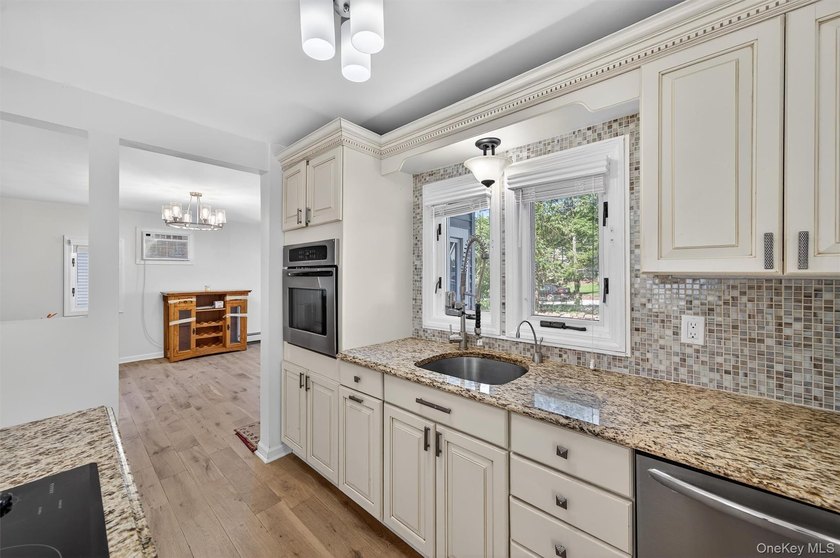 Experience the magic of lake living! Beautifully maintained home - photo 15