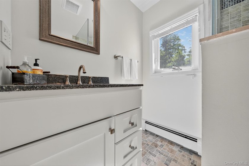 Experience the magic of lake living! Beautifully maintained home - photo 19